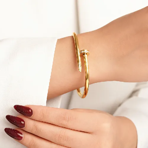 دستبند النگویی استیل 304 میخ طلایی (فری سایز)	